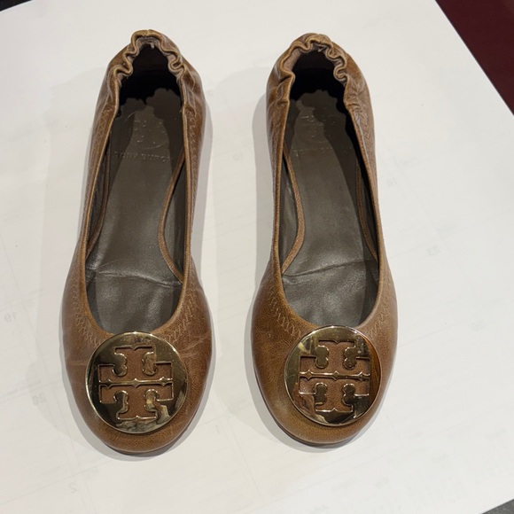 Tory Burch Shoes - Tory Burch Tan Leather Flats with Gold Emblem